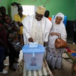 Presidential candidate Issa Tchiroma Bakary casts his vote on the day of Cameroon’s presidential election at a polling station in Garoua