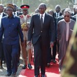 Kenya's President William Ruto walks with Former Kenyan Prime Minister Raila Odinga's brother, Oburu Odinga, on the day of Raila Odinga's funeral Mass, who died while receiving medical treatment in India, at the Jaramogi Oginga Odinga University of Science and Technology in Bondo, Siaya County, Kenya, October 19, 2025. REUTERS/Monicah Mwangi