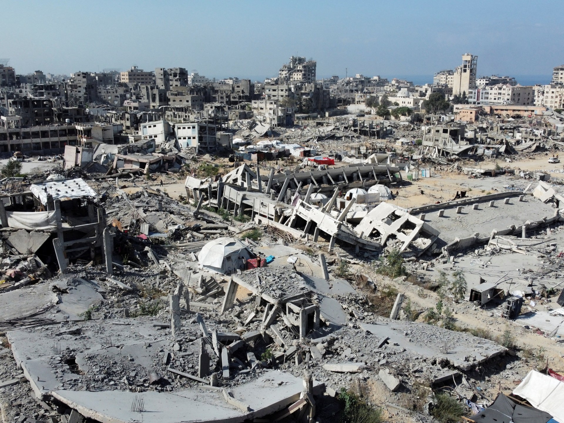Israel strikes Gaza, halts aid as both sides claim the other breached truce