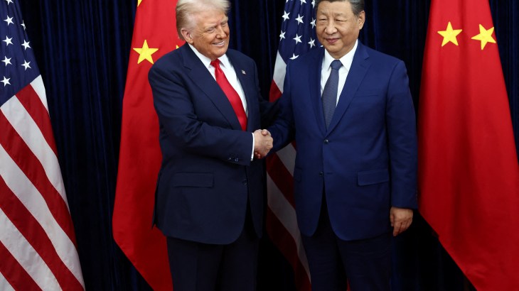 U.S. President Donald Trump greets Chinese President Xi Jinping as they hold a bilateral meeting at Gimhae International Airport, on the sidelines of the Asia-Pacific Economic Cooperation (APEC) summit, in Busan, South Korea, October 30, 2025.