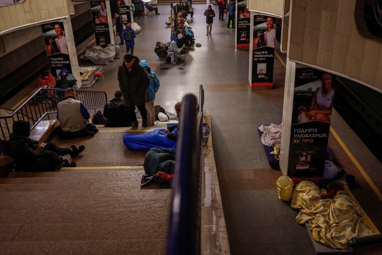 People take shelter inside a metro station during a Russian missile and drone strike, amid Russia's attack on Ukraine, in Kyiv, Ukraine October 30, 2025. REUTERS/Alina Smutko