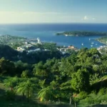 Live updates: Hurricane Melissa to make landfall in Jamaica A hilly Jamaican countryside with the coast and a town in the distance