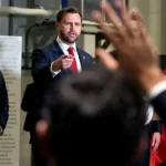 U.S. Vice President JD Vance calls on a reporter during a press conference following a military briefing at the Civilian Military Coordination Center in southern Israel