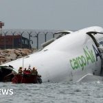 Emirates cargo plane skids off runway into sea at Hong Kong International Airport