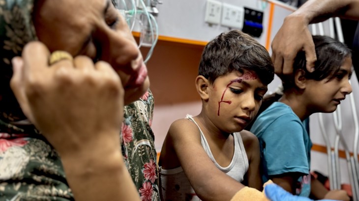 Wounded Palestinians, including children, receive medical treatment in an ambulance before being brought to Nasser Hospital after an Israeli strike on the Al-Mawasi tent area sheltering displaced families in southern Gaza, on October 29, 2025. Photojournalist:Abdallah F.s. Alattar