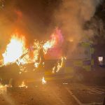 Hundreds of anti-immigrant protesters burn vehicle, attack police in Dublin