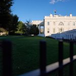 A view of the White House at sunset