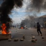 Opposition says ‘hundreds’ killed in Tanzania post-election protests People protest in the streets as fires burn.