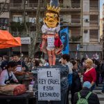High stakes for Javier Milei as midterm elections loom in Argentina An effigy of Javier Milei as a king is displayed above a protest sign on the streets of Argentina that reads in Spanish,