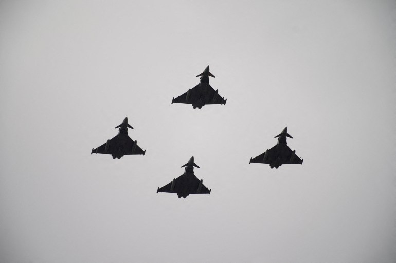 Spanish Air Force Eurofighter Typhoon fighter jets fly on the day of a military parade to mark the country's National Day, in Madrid, Spain, October 12, 2025. REUTERS/Ana Beltran