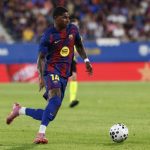 Barcelona's Marcus Rashford in action during the pre-La Liga season friendly soccer match between FC Barcelona and Como
