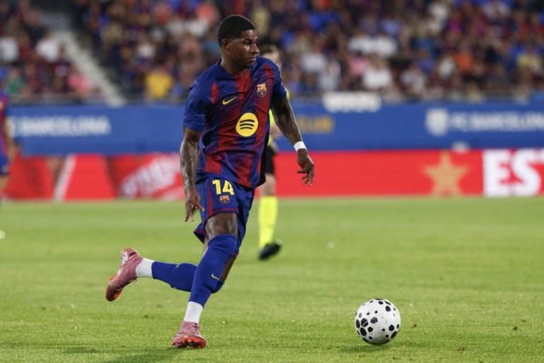 Barcelona's Marcus Rashford in action during the pre-La Liga season friendly soccer match between FC Barcelona and Como