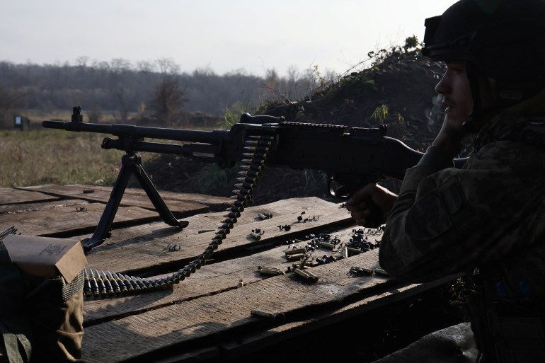 A recruit of the 65th Separate Mechanized Brigade of the Ukrainian Armed Forces uses an FN MAG machine gun during a military exercise at a training ground near a frontline, amid Russia's attack on Ukraine, in Zaporizhzhia region, Ukraine November 5, 2025. Andriy Andriyenko/Press Service of the 65th Separate Mechanized Brigade of the Ukrainian Armed Forces/Handout via REUTERS ATTENTION EDITORS - THIS IMAGE HAS BEEN SUPPLIED BY A THIRD PARTY