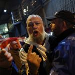Israeli supporters of Maccabi Tel Aviv soccer team watch the team play against Aston Villa in the Europa League