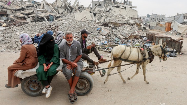 Hamas hands over Israeli soldier’s body as Israeli raids on Gaza continue