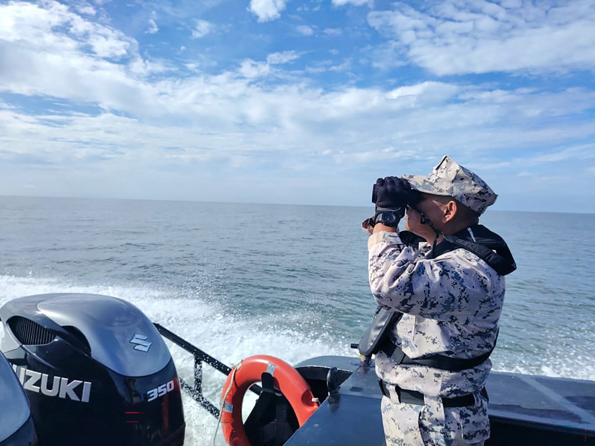 One dead, dozens missing after migrant boat sinks off Malaysian coast