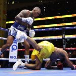 Chris Eubank Jr and Conor Benn in action.