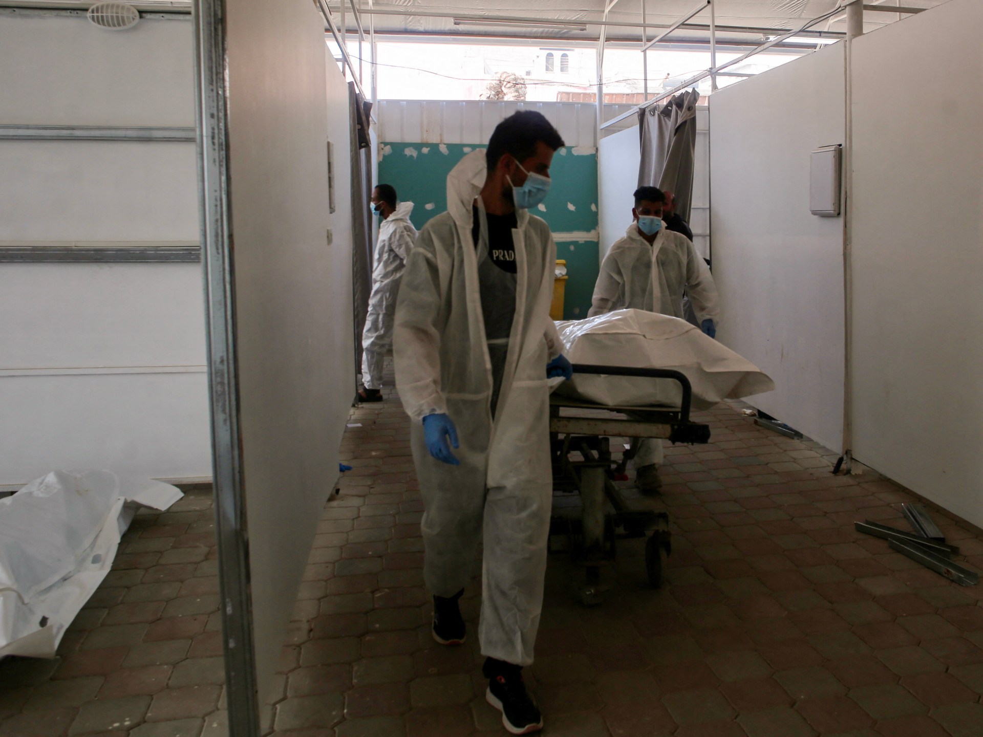 Israel returns 30 bodies of slain Palestinians as new strikes hit Gaza