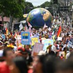 Thousands of people take part in the so-called "Great People's March" in the sidelines of the COP30 UN Climate Change Conference in Belem, Para State, Brazil on November 15, 2025.
