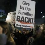 Two coffins of hostages on their way to Israeli troops amid tenuous ceasefire Two coffins of hostages on their way to Israeli troops amid tenuous ceasefire