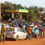 FILE PHOTO: People gather at a petrol station in Bamako, Mali, November 1, 2025, amid ongoing fuel shortages caused by a blockade imposed by al Qaeda-linked insurgents in early September. REUTERS/Stringer/File Photo
